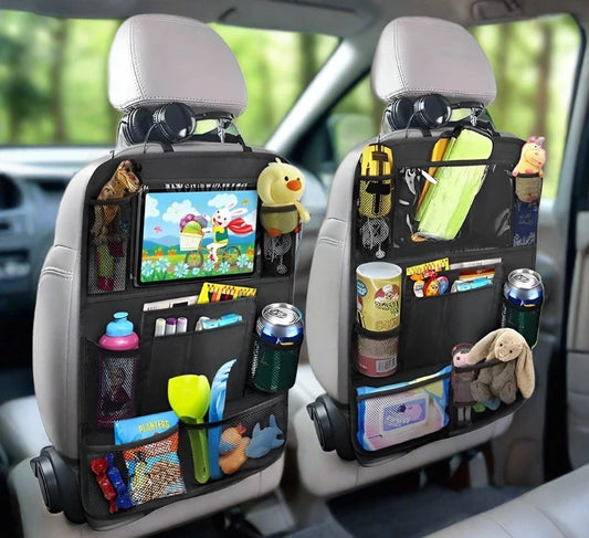 Car back seat organizer that holds kids food, beverage, and entertainment.